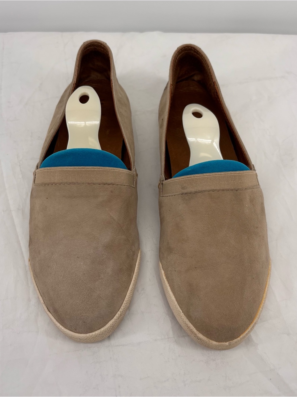 These are Frye Women's Melanie Slip On Sneakers in a taupe color